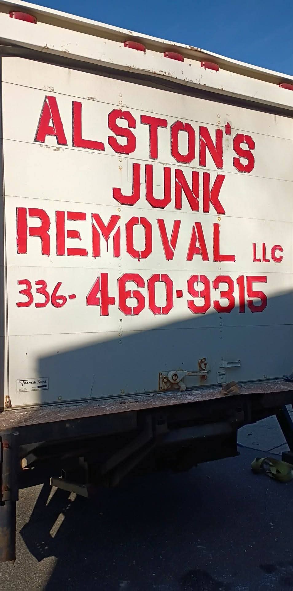 Alston's 15ft box truck loaded with brush and debris